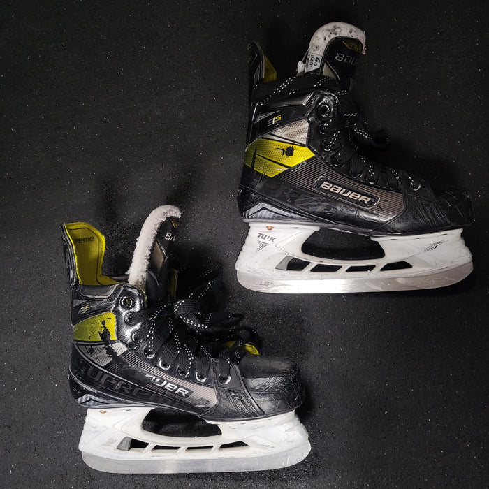 Used Bauer Supreme Black/Gold Hockey Skates Size 4.5